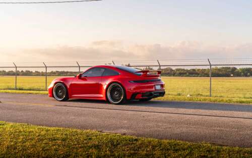 A professional photograph of a Porsche 992 GTS sports car. 7680x4800 wallpaper for pc download