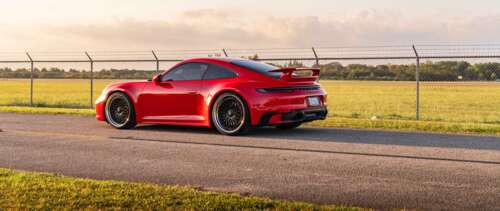 A professional photograph of a Porsche 992 GTS sports car. UWUHD free background