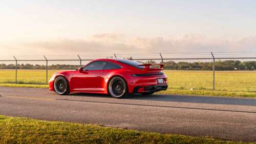 A professional photograph of a Porsche 992 GTS sports car. 4K (Ultra HD) free wallpaper