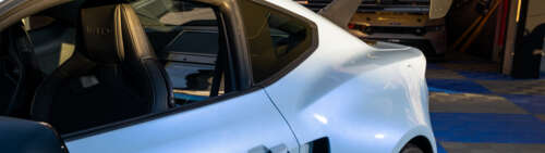 A detailed view of a Ford Mustang GTD featuring its aggressive aerodynamic styling... Dual UHD pictures for wallpaper