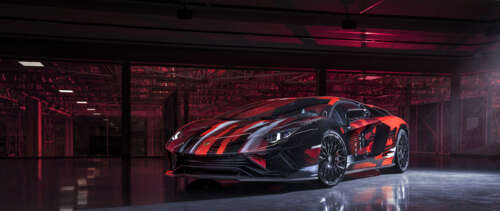 A sleek, high-performance Lamborghini Aventador S supercar featuring aggressive aerodynamic... UWUHD wallpaper for laptop download