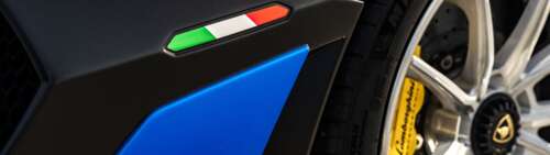 A high-performance Lamborghini Aventador SVJ supercar displaying its aerodynamic... Dual UHD hd background