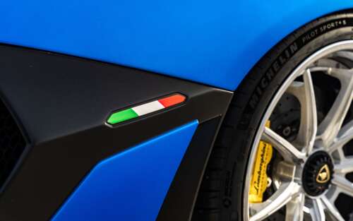 A high-performance Lamborghini Aventador SVJ supercar displaying its aerodynamic... 7680x4800 wallpaper