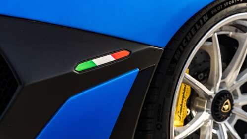 A high-performance Lamborghini Aventador SVJ supercar displaying its aerodynamic... 4K (Ultra HD) hd background