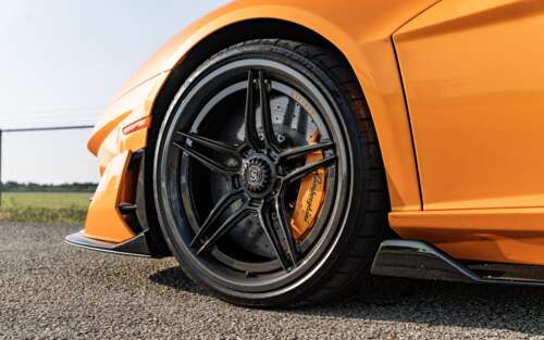 A high-performance Lamborghini Aventador SVJ supercar featuring its iconic aerodynamic... 7680x4800 desktop wallpaper