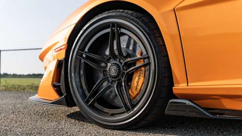 A high-performance Lamborghini Aventador SVJ supercar featuring its iconic aerodynamic... 8K