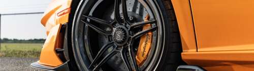 A high-performance Lamborghini Aventador SVJ supercar featuring its iconic aerodynamic... Dual UHD