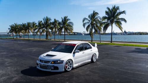 High-performance Mitsubishi Lancer Evolution IX sports sedan in a striking pose 4K (Ultra HD) free desktop wallpaper