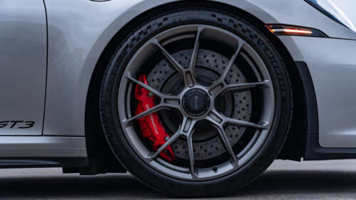 A high-performance Porsche GT3 RS sports car featuring aerodynamic bodywork and a... 4K (Ultra HD) free wallpaper for computer
