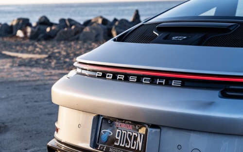 A high-performance Porsche GT3 RS sports car featuring aggressive aerodynamic styling... 7680x4800 free background