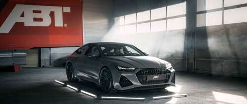 A high-performance Audi RS7 luxury sports car featuring a sleek, aerodynamic design... UWUHD