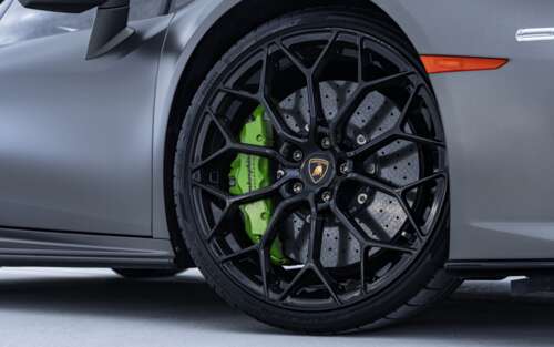 A high-performance Lamborghini Huracan sports car in a sharp, detailed view. 7680x4800 free wallpaper for computer