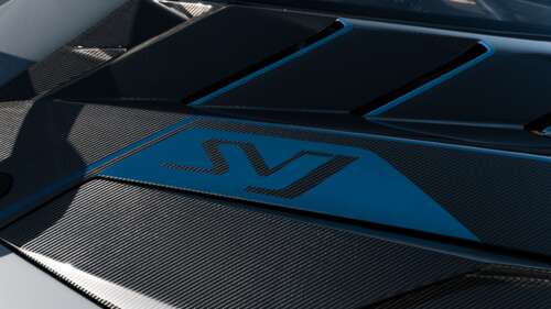 A high-performance Lamborghini supercar featuring a streamlined, aerodynamic body... 8K free background
