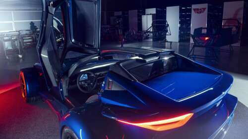 A sleek, metallic silver sports car reflecting soft studio lights against a dark... 4K (Ultra HD) computer backgrounds