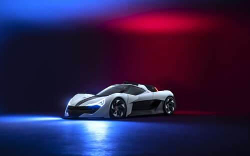 A sleek, aerodynamic modern sports car presented in a professional studio setting. 7680x4800 wallpaper photo gallery download