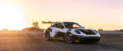 A high-performance Porsche GT3 RS sports car featuring aggressive aerodynamic bodywork... UWUHD free desktop wallpaper