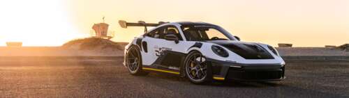 A high-performance Porsche GT3 RS sports car featuring aggressive aerodynamic bodywork... Dual UHD free background images