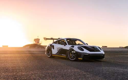 A high-performance Porsche GT3 RS sports car featuring aggressive aerodynamic bodywork... 7680x4800 wallpaper download