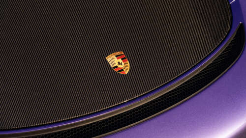 A high-performance Porsche GT3 RS sports car showcasing its aerodynamic features... 8K hd background