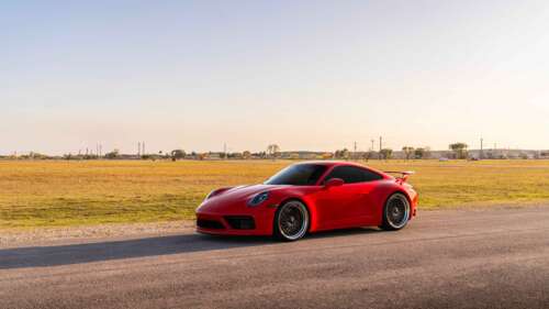 A sleek and powerful Porsche 992 GTS sports car featuring modern aerodynamic design... 8K free hd wallpapers