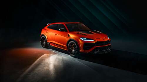 A cinematic, high-resolution view of the 2026 Lamborghini Urus SE in a dark, urban... background images hd