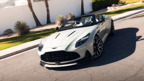 A high-resolution, detailed shot of a sleek Aston Martin DB12 S Volante luxury convertible. free wallpaper