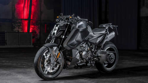 A close-up of a dark, futuristic Brabus 1400 R Signature Edition motorcycle featuring... free wallpaper