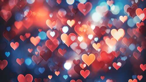 A vibrant collection of multi-colored hearts floating over a soft, out-of-focus bokeh... background images hd
