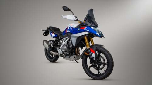 A collection of futuristic and rugged adventure motorcycles on display at the EICMA... wallpaper