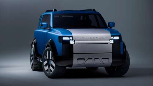 A high-resolution, detailed view of a modern electric SUV with a polished, aerodynamic...