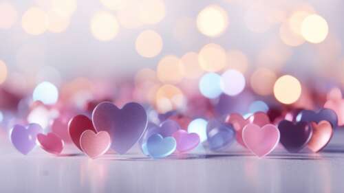 Close-up of glossy, reflective red and pink hearts set against a soft-focus bokeh... wallpaper images