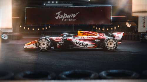 The VCARB 03 Formula One car racing through a turn at the Japanese Grand Prix. computer backgrounds