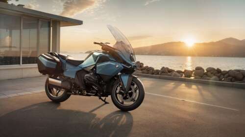 A detailed view of the 2025 BMW R 1300 RT touring motorcycle, featuring a modern...