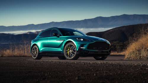 A high-resolution, detailed shot of the 2026 Aston Martin DBX S luxury SUV featuring... free wallpaper