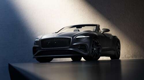 A sleek 2026 Bentley Continental GT Speed Convertible in a high-detail studio setting. wallpaper download