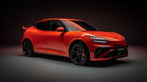 A futuristic 2026 Genesis GV60 Magma electric crossover featuring a sleek aerodynamic... high definition wallpaper