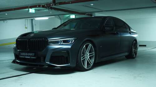 A high-resolution, detailed shot of a BMW 7 Series luxury sedan featuring sleek metallic... wallpaper photo gallery download