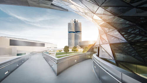 The architectural structure of the BMW Headquarters in Munich, Germany, featuring... free wallpaper