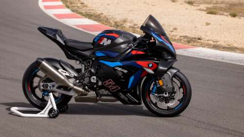 A BMW M 1000 RR sports motorcycle parked on a clean asphalt road wallpaper for pc download