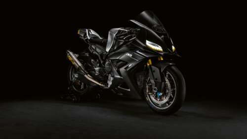 A futuristic BMW Motorrad Concept RR motorcycle with a dark, sleek design against... wallpaper photo gallery download