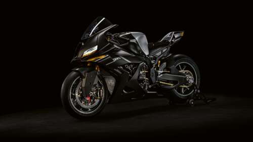 A futuristic BMW Motorrad Concept RR 2026 motorcycle with sleek aerodynamic design... free background