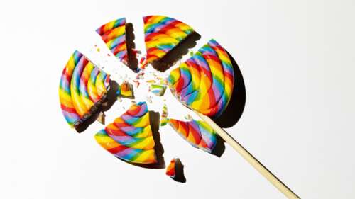 A broken, colorful rainbow spiral lollipop on a plain white background. wallpaper download