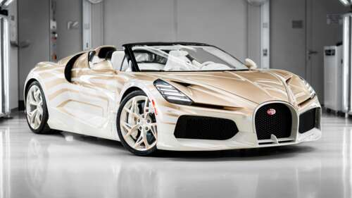 A high-detail close-up of the Bugatti W16 Mistral luxury hypercar, highlighting its... free wallpaper