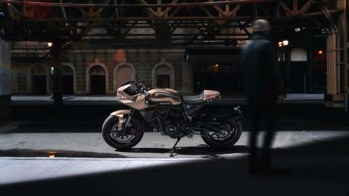 A high-resolution concept design of a customized Ducati Scrambler cafe racer motorcycle... wallpaper download