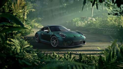 A high-detail shot of a Porsche 911 GT3 Touring featuring a deep green aesthetic... wallpaper for laptop download