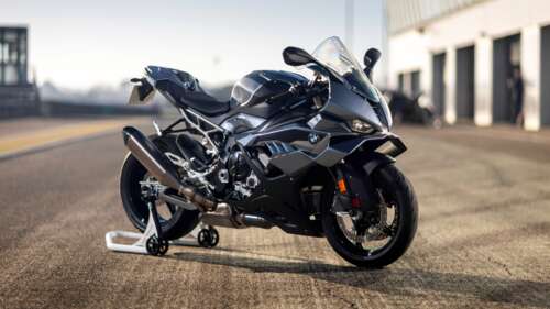 A sleek and aerodynamic 2025 sports motorcycle with high-tech features and metallic... wallpaper download
