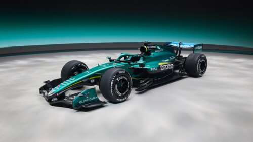 Close-up view of futuristic 2026 Formula One racing cars showcasing advanced aerodynamic... desktop wallpaper