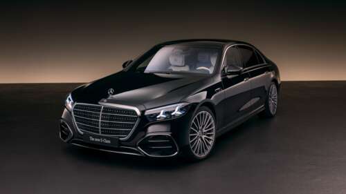 A lineup of premium black luxury cars with futuristic designs and polished finishes,... free background