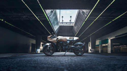 A high-tech cafe racer concept motorcycle with a streamlined frame and metallic accents.