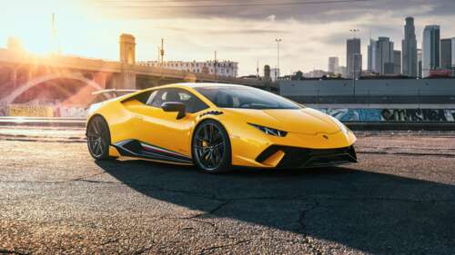 A group of high-performance yellow cars captured in stunning 5K detail. wallpaper